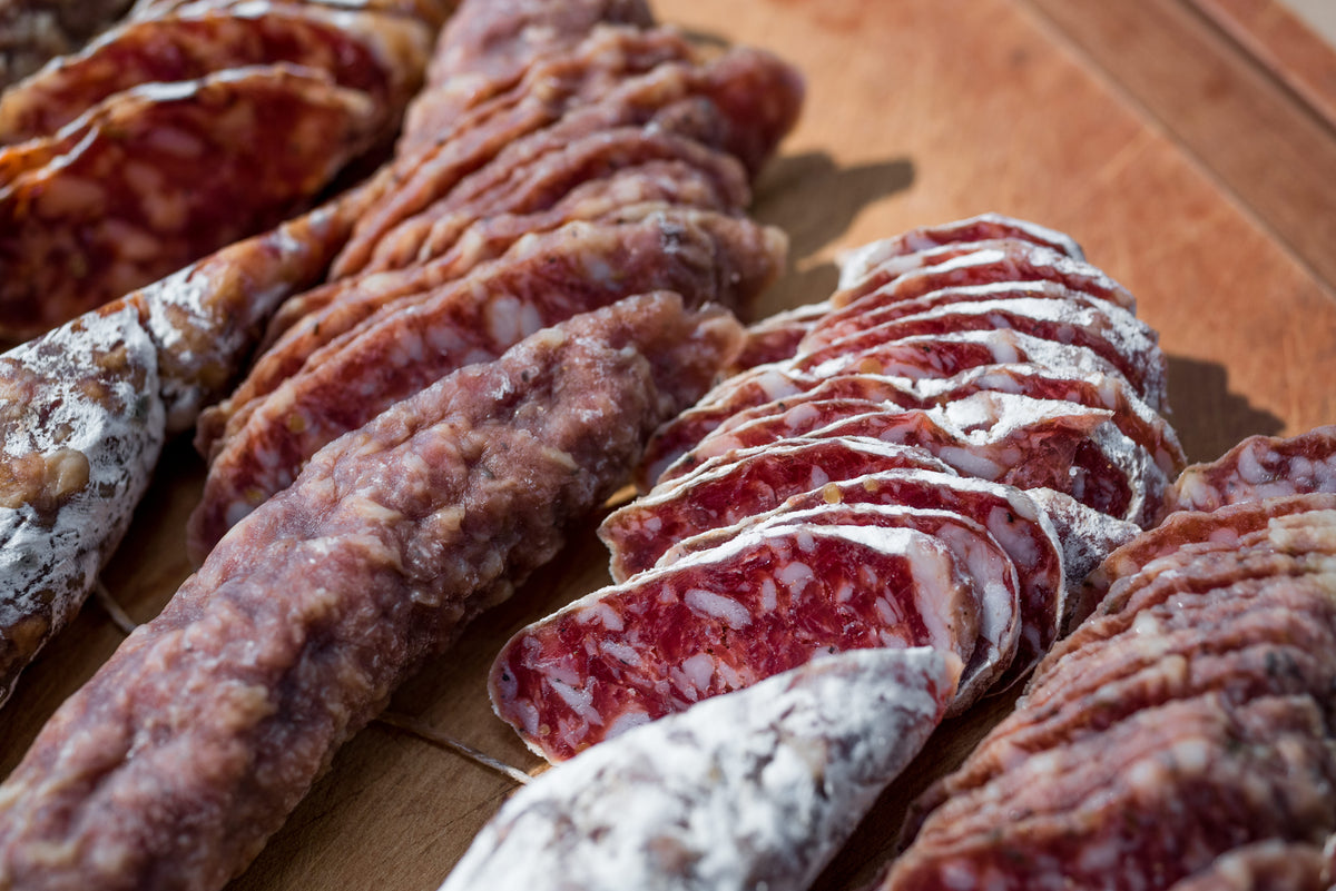 Sliced JACÜTERIE salami, dry-cured in the Hudson Valley